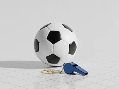 Açık zeminde futbol topu ve kobalt düdük